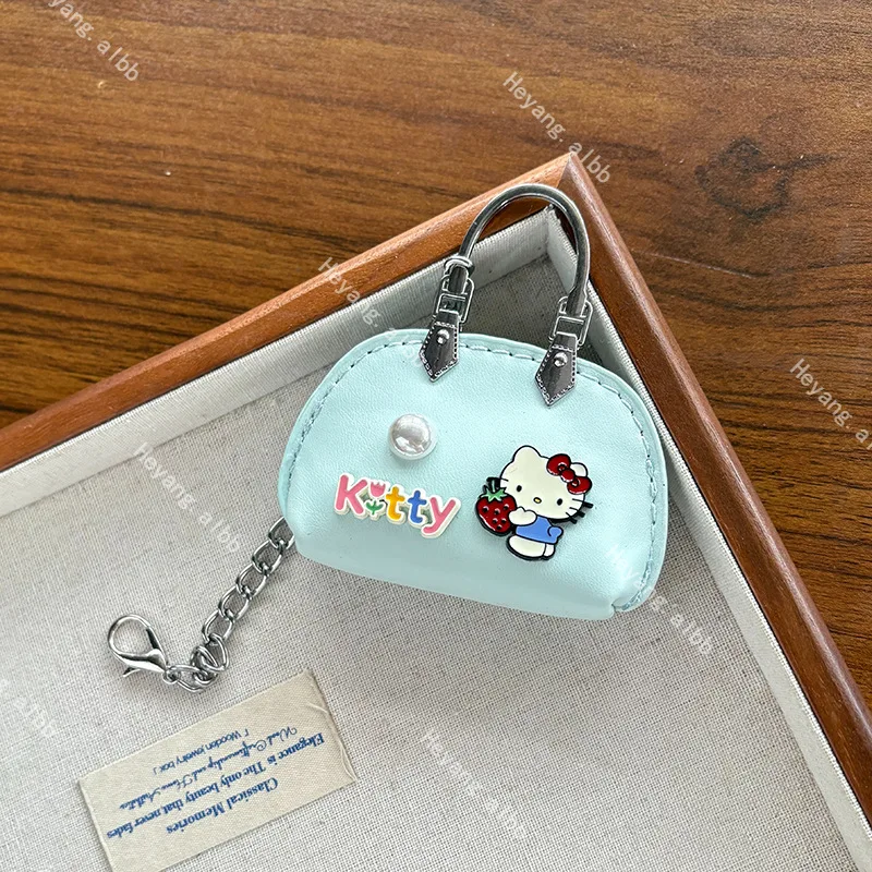 Hello Kitty, bolso fresco de verano a la moda, llavero colgante, colgante de chica a la moda, estuche de joyería versátil de alta gama, soporte de almacenamiento