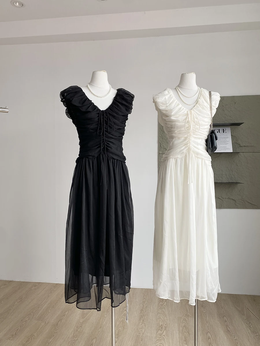 فستان نسائي صيفي أنيق بياقة على شكل V بدون أكمام مكشكش فستان طويل للسيدات بلون سادة وأربطة على شكل حرف A