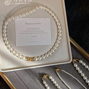 Nachahmung der weißen magnetischen Perle Runde Schnalle Perlen Kette Halskette 2024 Neue Kollaps -Kollaps eleganter Schmuck für Frauen 8 Hauptverkaufskette Imam - №4