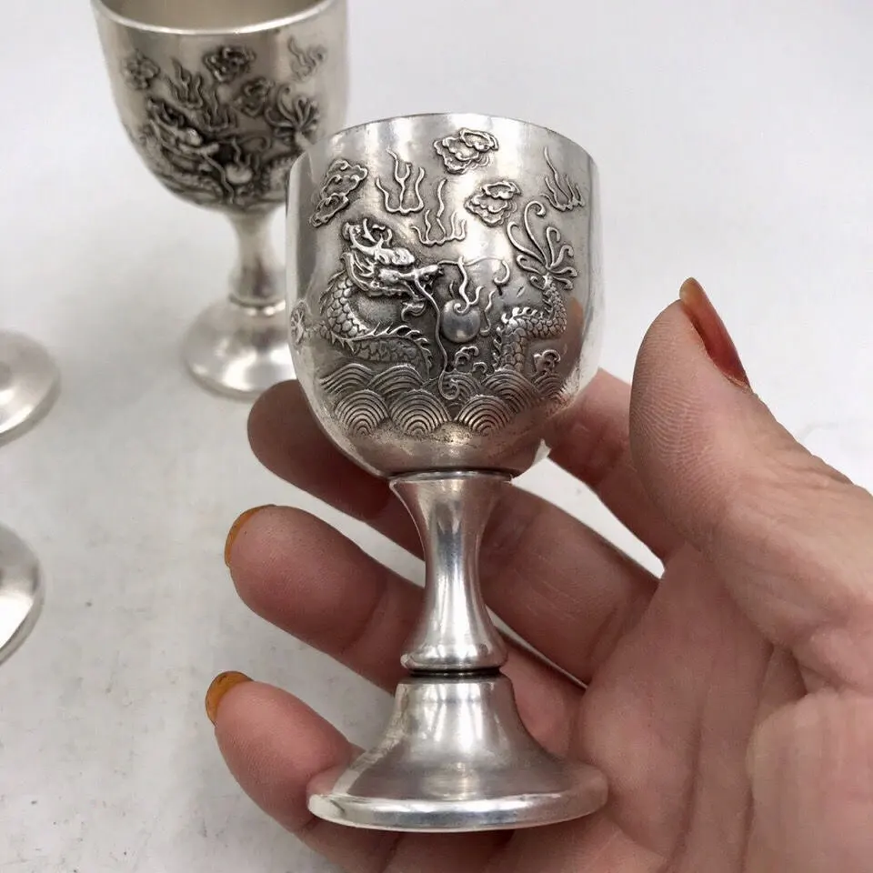 

1pcs Chinese antique wine cup white copper relief dragon high footed cup Chinese retro ornament home desktop decoration