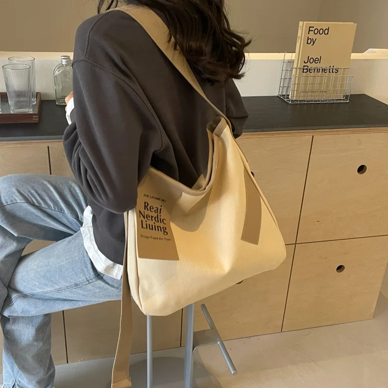 

Niche large-capacity Tote bag bag female 2025 new casual hundreds of canvas bag student classroom single shoulder crossbody bags