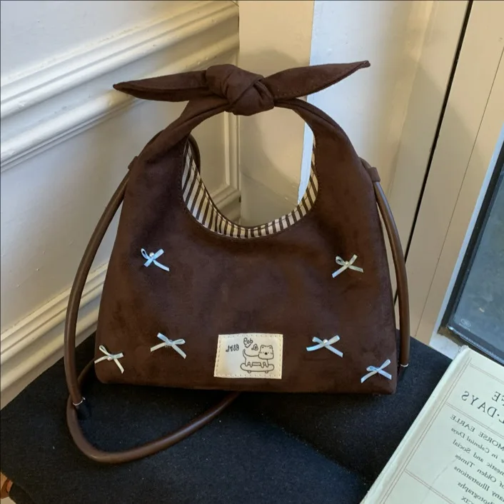 

Small Handbag Women's New Niche Sweet Bow Fashion Versatile Casual Shoulder Crossbody Bag Commuting Cloud Bag