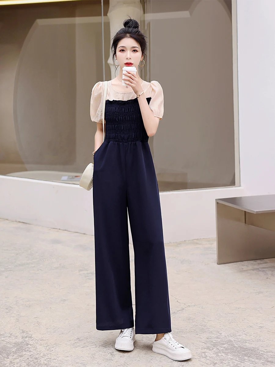 กางเกงเอวสูงแฟชั่นผู้หญิง สไตล์ลำลองสำหรับฤดูร้อน รุ่นใหม่ ช่วยให้ดูผอม ทรงขากว้าง จั๊มพ์สูทใส่สบาย เหมาะกับการเดินทาง ผ้าบางเบา...