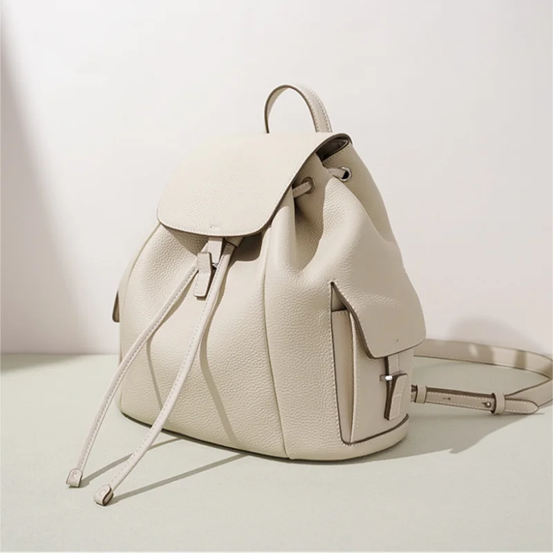 

Korean Japanese Casual Drawstring Flip Cover Backpack Women Bags Top Layer Cowhide Early Spring Fashion Leather Commuter Handbag
