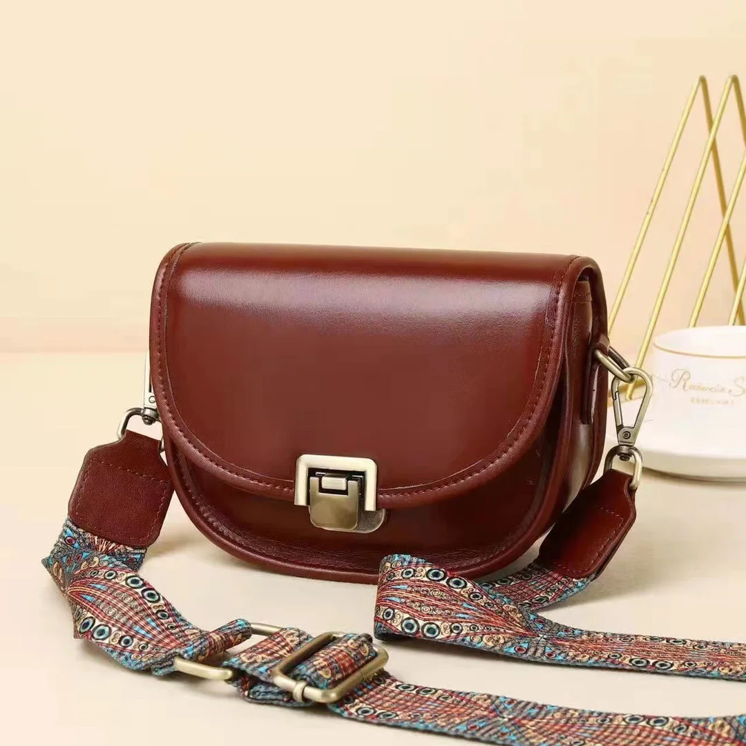 

Hot selling women's bag, saddle bag, genuine leather crossbody small bag, versatile wide shoulder strap single shoulder bag, pur