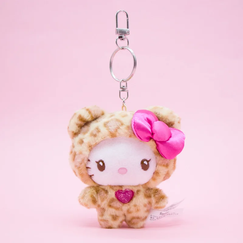 Miniso sanrio olá kitty boneca de pelúcia saco ornamentos rosa e amarelo latte pele escura saia leopardo padrão chaveiro bonito arco-nó