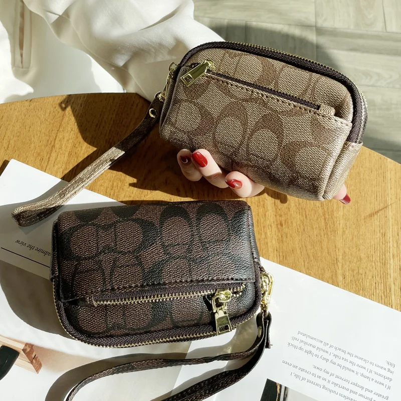 2026 NUEVO Monedero delicado con tres cremalleras, mini bolso de mano multifuncional, bolso de mano de celebridad en línea para niñas