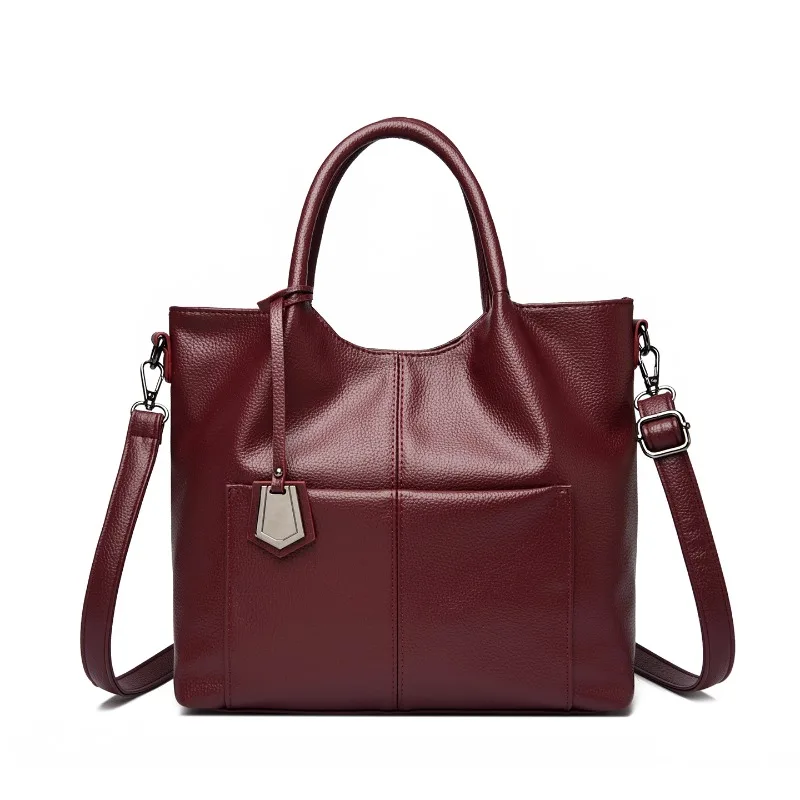 

Стильная модная винтажная сумка для подгузников: женская кожаная сумочка, роскошная городская сумка с логотипом и минималистичным парижским дизайном.