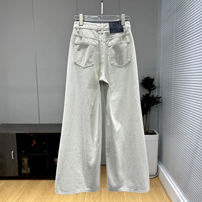 I nuovi jeans lavati casual a gamba larga dimagranti a vita medio-alta alla moda della primavera del 2025 per le donne