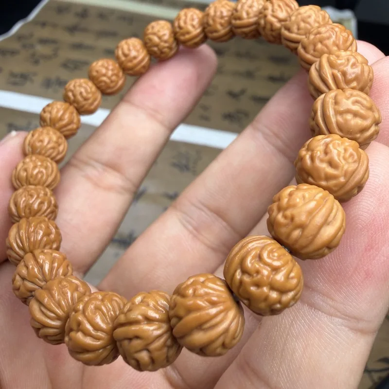 All items: carving, brain pattern pit monkey head walnut bracelet, Beijing-style eight-sided peach single