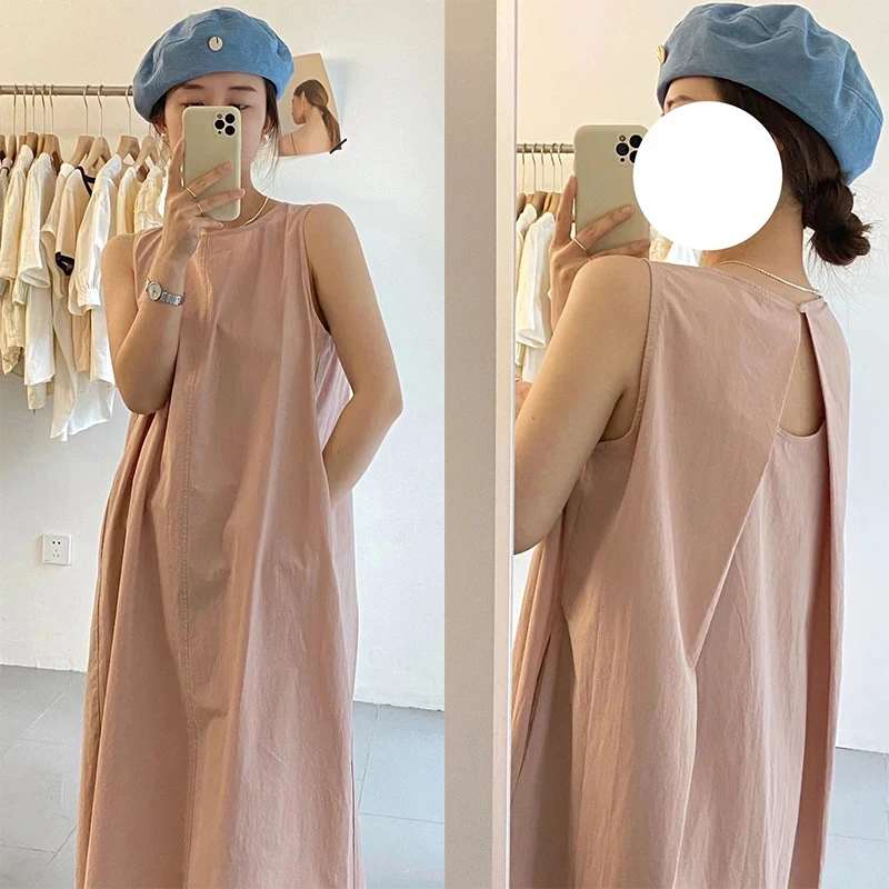 เสื้อกั๊กทรงหลวมสไตล์เกาหลีสีชมพูพาสเทล ดีไซน์เก๋ไก๋ พร้อมกระโปรงทรงเอ สไตล์ลำลอง ผ่าข้าง เหมาะสำหรับฤดูร้อน