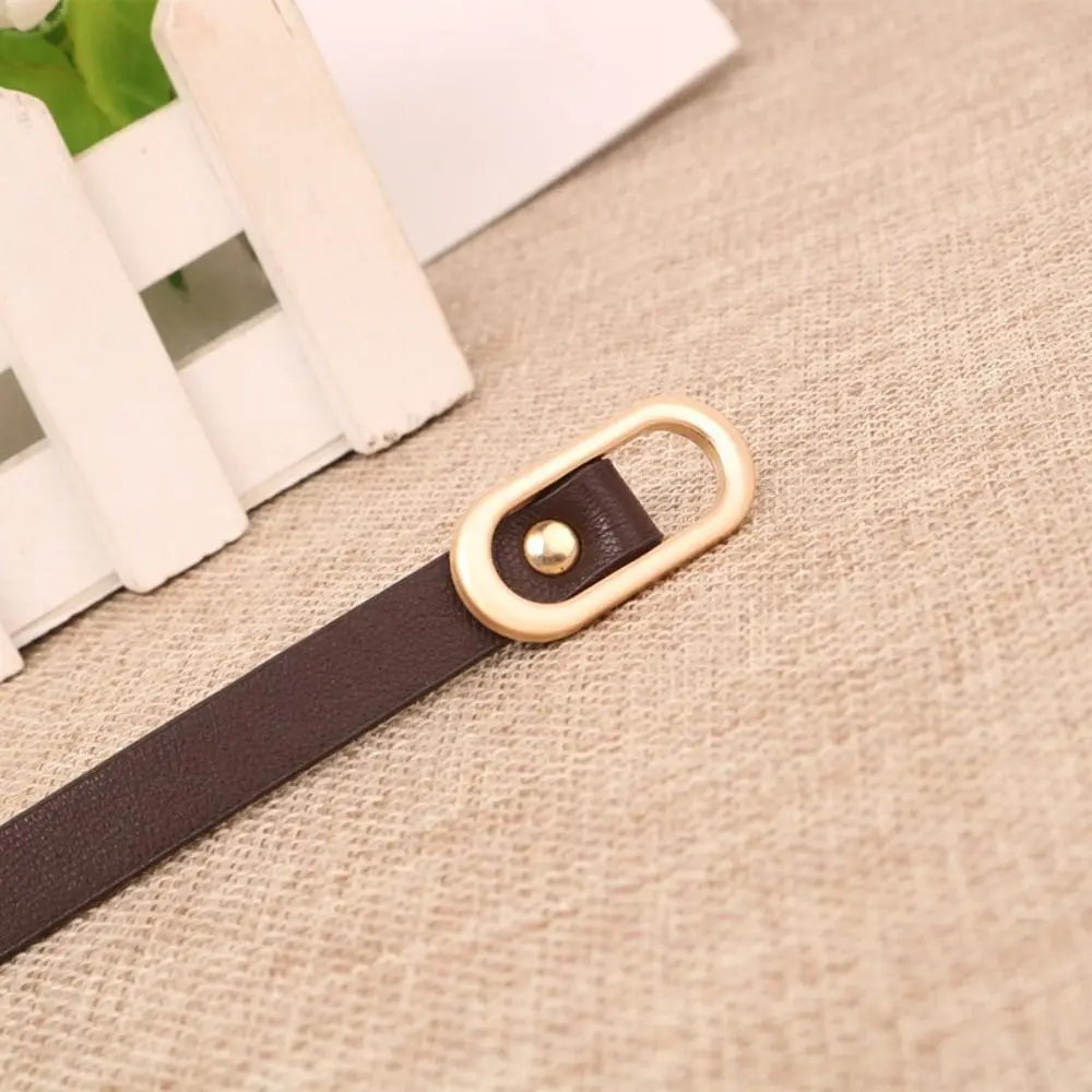 ชุดเดรส Jin Gaya Korea ทรงรีเข็มขัดขนาดเล็กหนัง PU เรียบง่ายสำหรับผู้หญิงใหม่เข็มขัดสานย้อนยุคแนวแฟชั่นทรงรีขนาดเล็ก