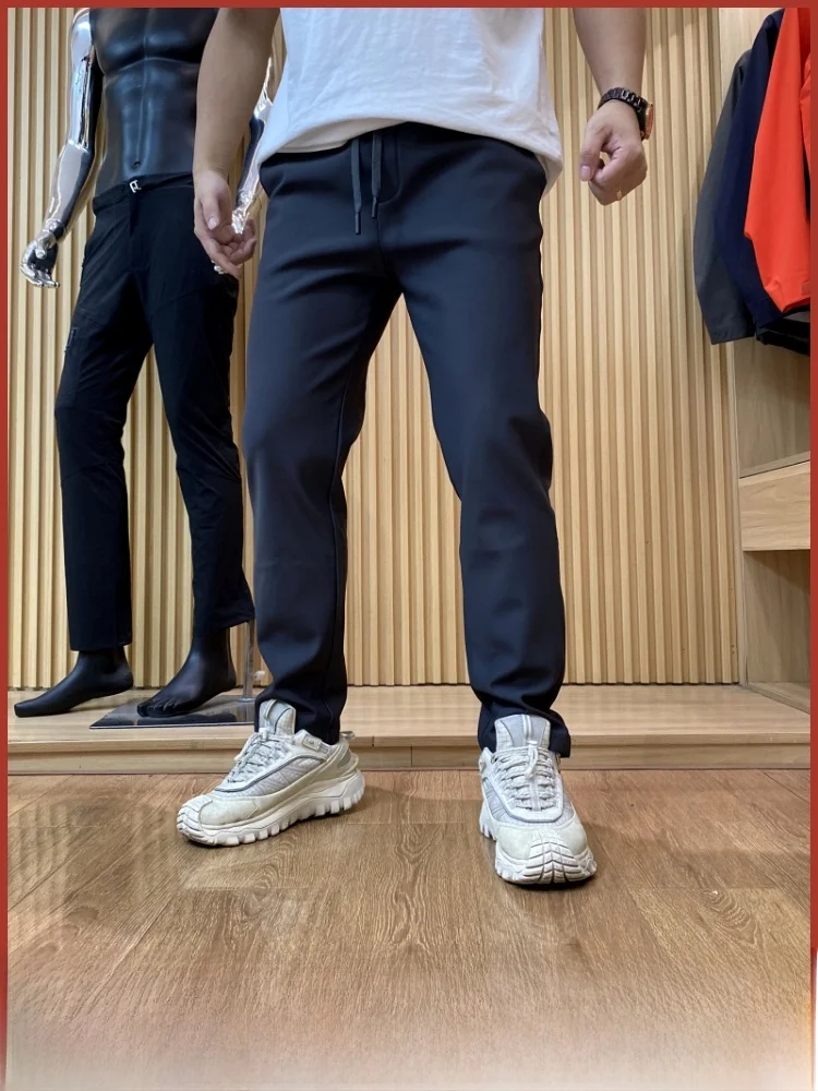 

Men's Fce Lined Elastic Waist Straight Leg Casual Pants Autumn Winter Faionable Trendy Nylon Polyester Blend Comfortable...