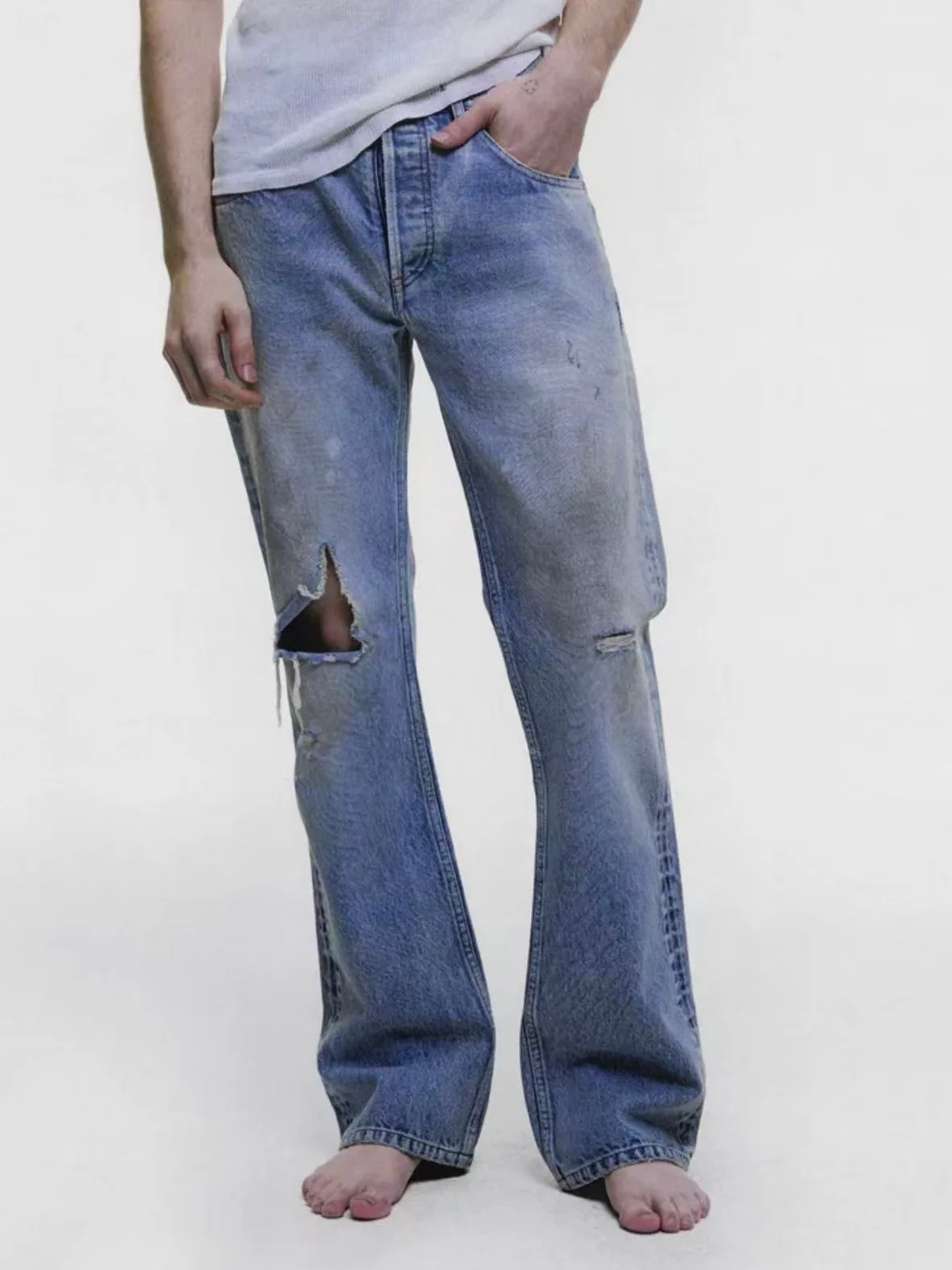 

Worn-In Dirty Denim Jeans Five Pocket Pressed Logo Patch Washed out Distressed Standard Fit mid Waist Zipper Fly Summer Wear