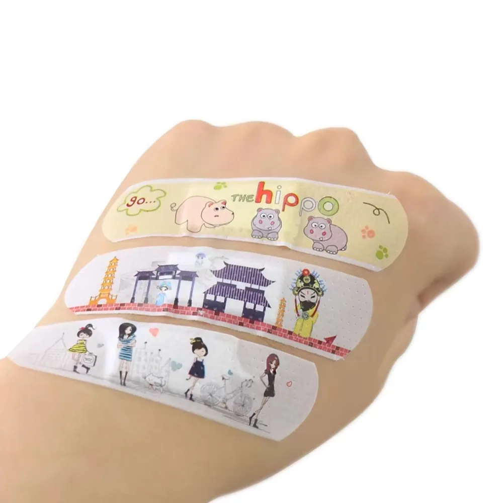 20 ชิ้นกันน้ํา Breathable การ์ตูน Breathable ผ้าพันแผลกาว Hemostasis PE แถบสําหรับเด็ก First Aid Kits & Emergency Care