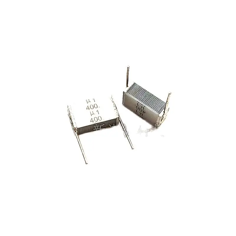 10 uds/400V 104 0,1 UF 100NF pastel de lasaña núcleo blanco condensador laminado distancia del pie 10mm