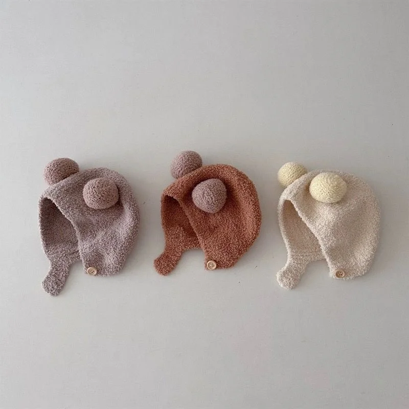 Cute Winter Warm Kids Girl Boys Baby Hats Fleece Wool Hemming Caps with Ball Solid Wool Ear Protection Hats Soft Newborn Bonnet.