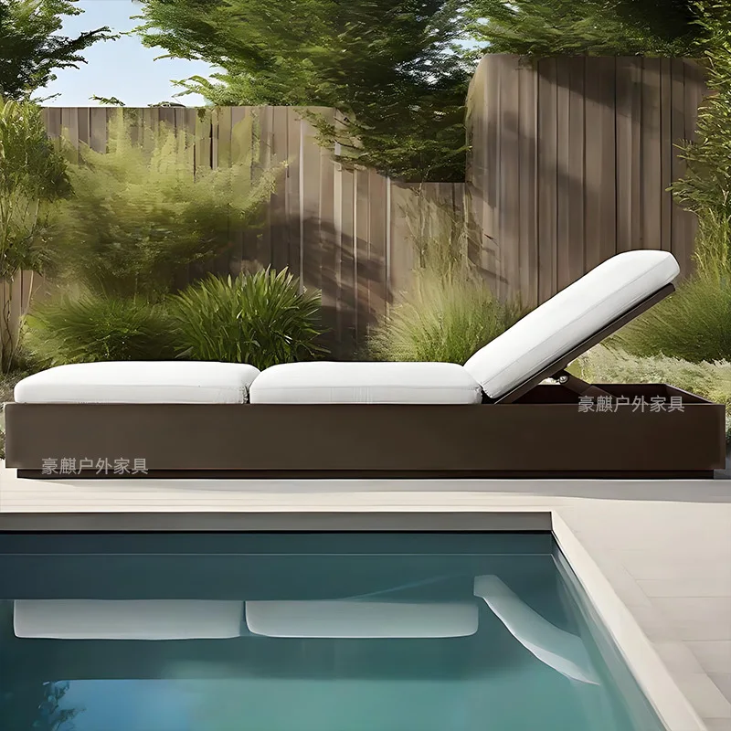 Outdoor teak sunbed, distressed finish, for leisure use in hotels, beachside, poolside, and open-air settings; weather-resistant