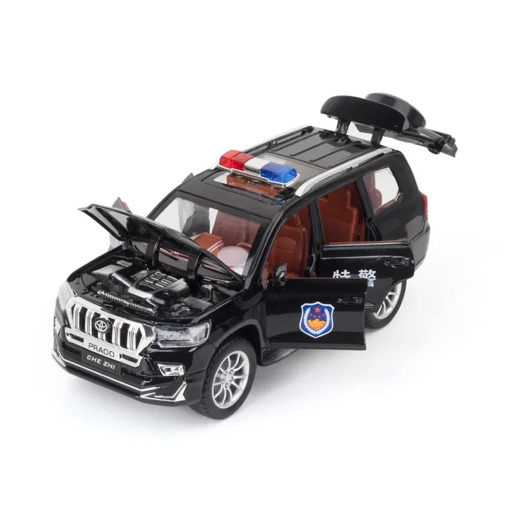 Coche de policía Prado 1:24, modelo de aleación de alta simulación, luz de sonido, juguetes para niños, regalos, modelo de coche de aleación fundido a presión coleccionable