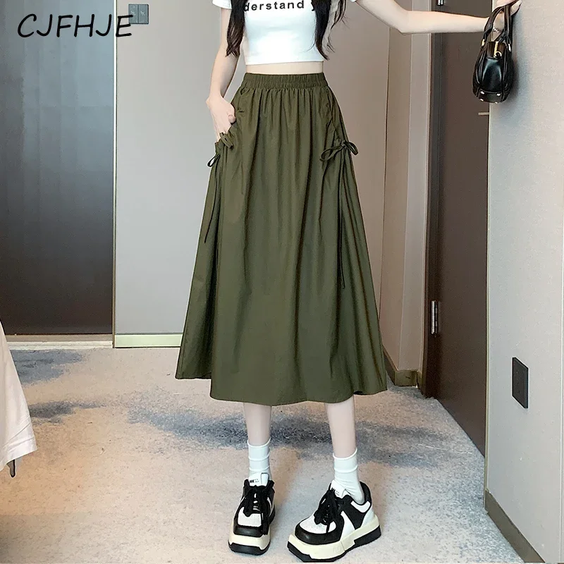 

CJFHJE New Women Versatile Lace Up Drawstring Pocket Skirt Korean Fashion High Waist Workwear Mid Length Women's A-line Skirt