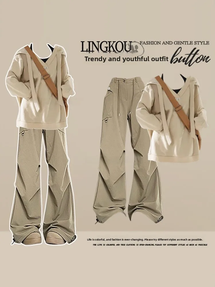 

Элегантный комплект из двух предметов: свитшот в корейском стиле для полных женщин на раннюю осень и брюки с высокой талией для отдыха и работы.