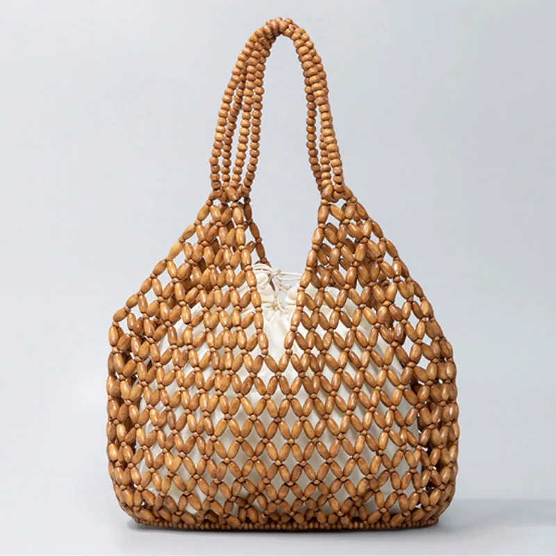 Handwoven women handbag 2024 new design hollow out women bag fashion and casual bucket bag shoulder bag