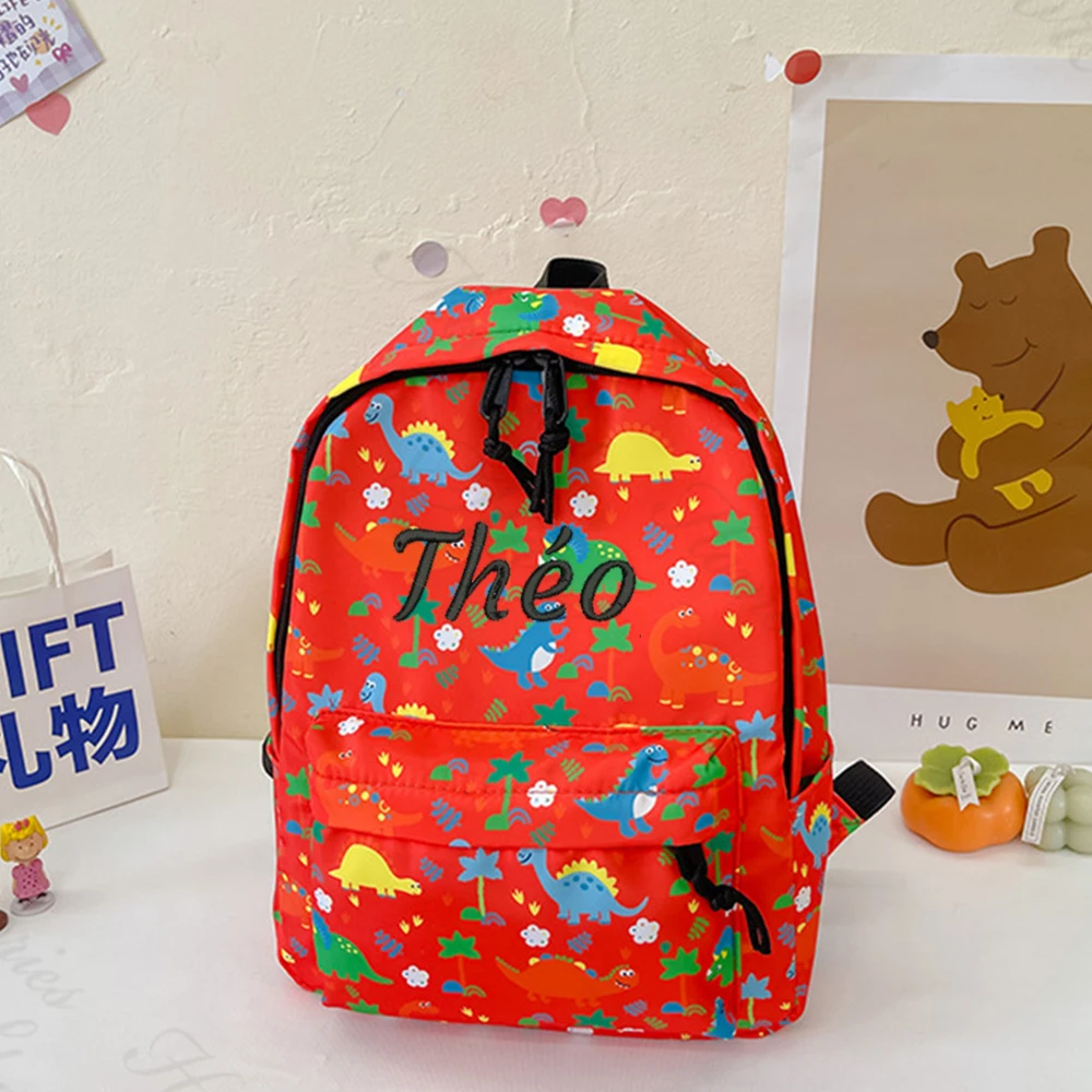 Mochila para niños de guardería con pequeño dinosaurio, mochilas pequeñas bordadas ligeras con nombre personalizado de dibujos animados para niños