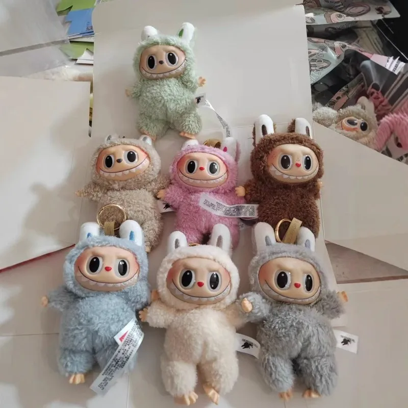 

In 2025, the new POPMART POP MART LABUBUBUBU moved macaroon vinyl face series trend blind box tide play hand-made