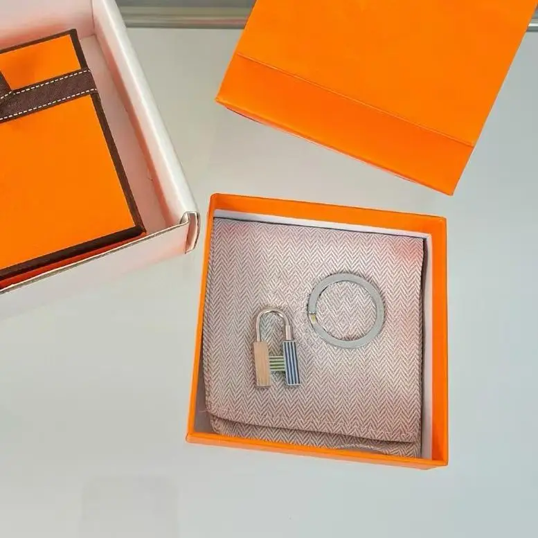 

European and American retro metal sense rainbow lock keychain French light luxury niche design advanced sense bag pendant