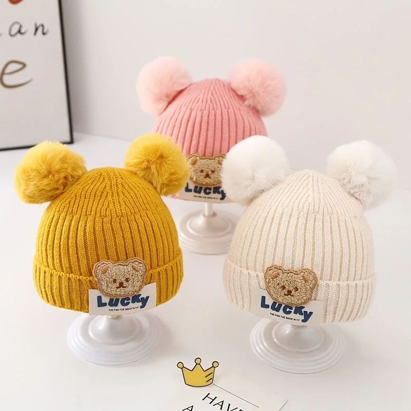 Niedliche doppelte Pompon Baby Mütze Mütze koreanische Bär Kleinkind Junge Mädchen Strick mütze Herbst Winter warme Säugling Gehörschutz Motorhaube Kappen