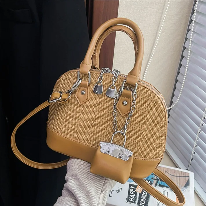 

Retro hand-held shell bag new versatile shoulder bag for women commuting women handbag luxury design