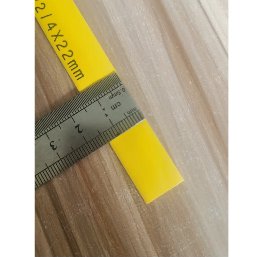 

Термоусадочная трубка с высоким коэффициентом усадки 2:1, с графическим принтом, шириной 14 мм, для электронных линий, желтая, для машинной укладки.