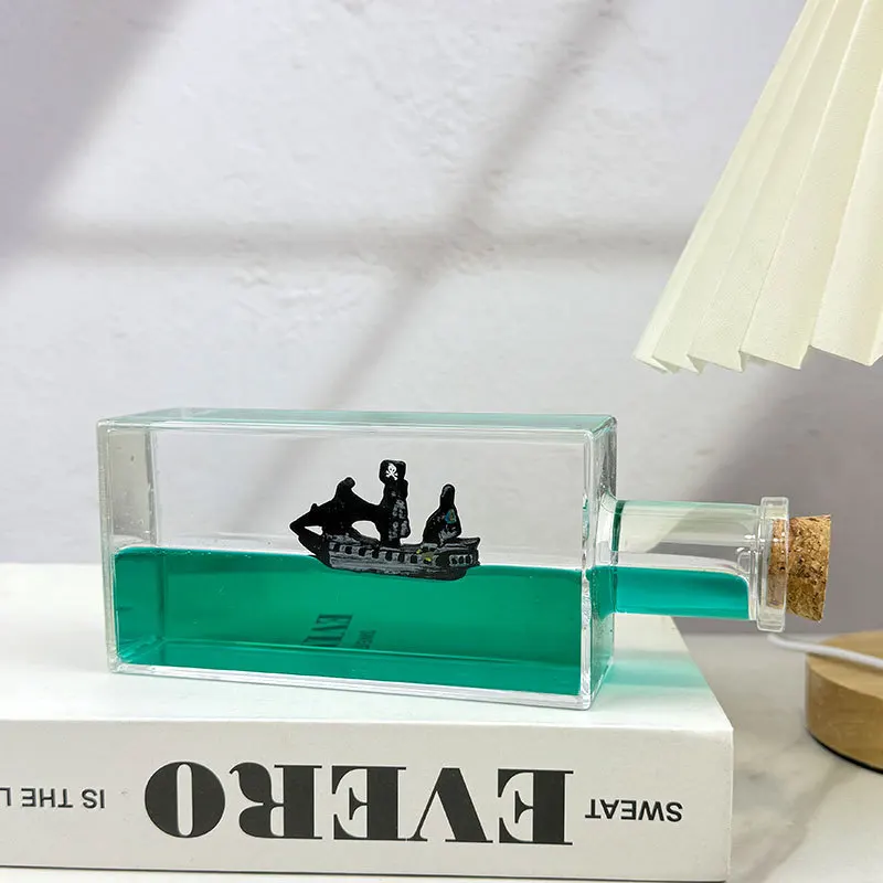 

Ghost Ship Black Pearl Cruise Ship Fluid Liquid Drift Bottle Floating Boat Office Desktop Ornament Home Decor Birthday Gifts