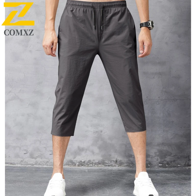 

Big Size Men Casual Pants Summer Ice Silk Lightweight Breathable Loose Sports Shorts Elastic Waist Outdoor Cycling Running Pants