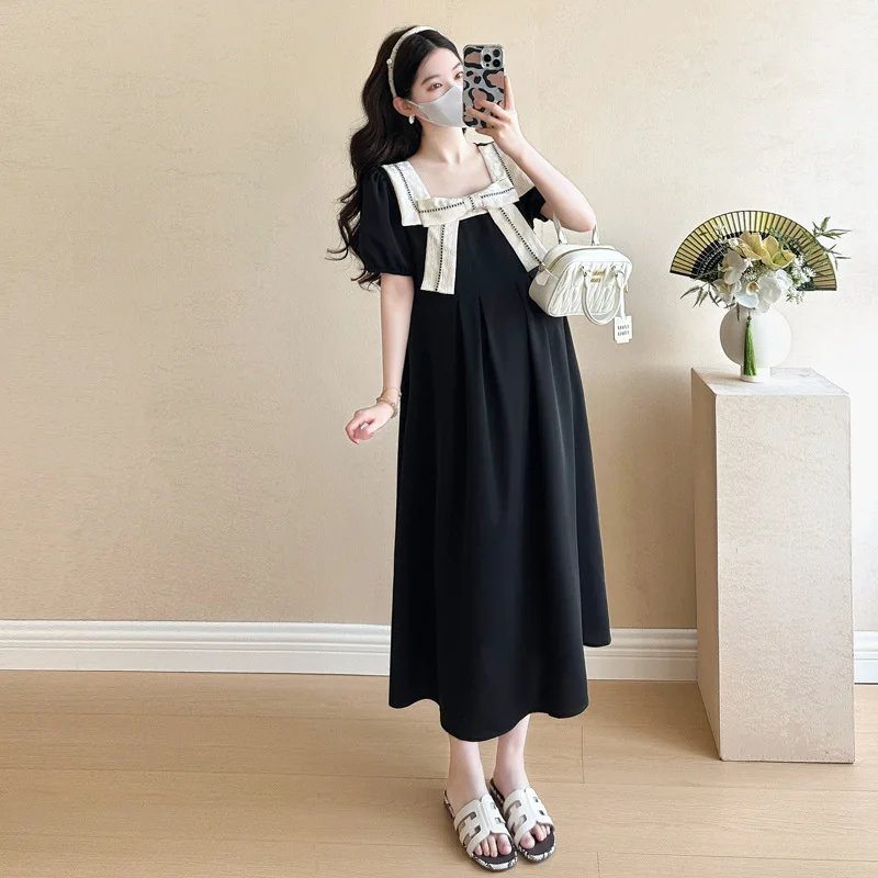 الأمومة فستان أسود صغير الصيف جديد القوس لهجة التباين تقليم ألف خط فستان العمل سليم صالح فستان جذاب للنساء الحوامل