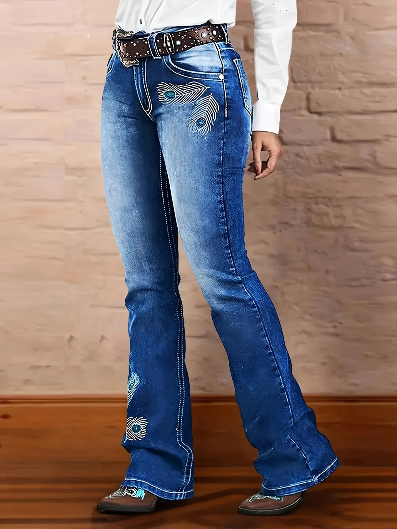 

Women's mid to high waisted washed and polished white, peacock feather decorated retro micro flared slim fit jeans