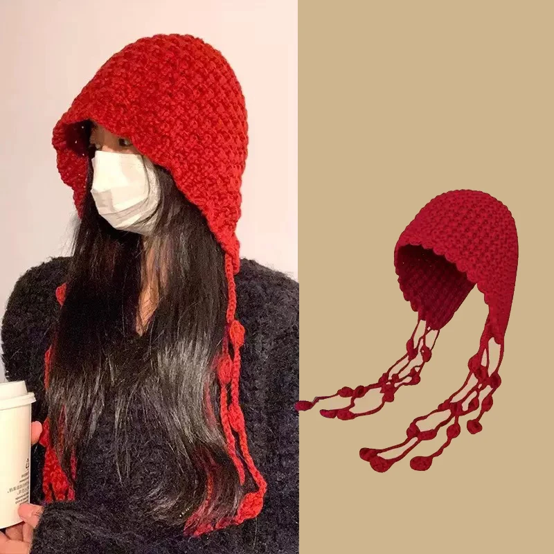 Autumn And Winter Warm Wool Hat Hand-woven Hollow Bag Hat Women's Ethnic Style Fringed Ear Protector Knitted Hat