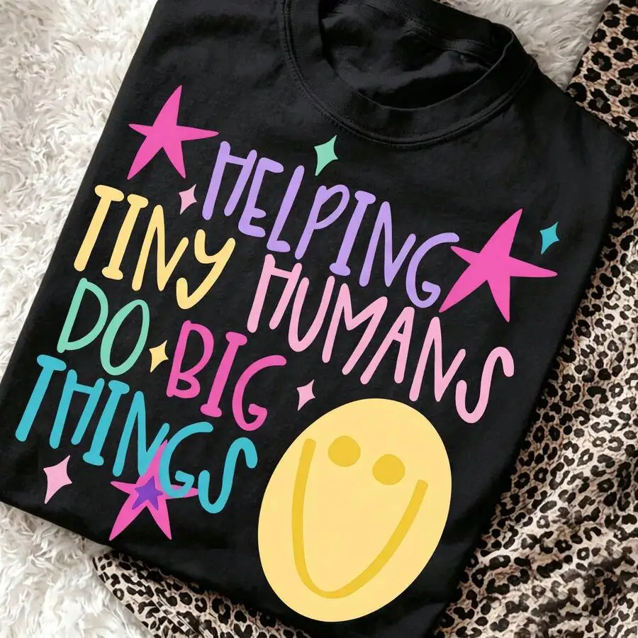 Helping Tiny Humans Do Big Things Teacher Graphic Tee Cute Face Star Print Elementary School Kindergarten Teacher T-Shirt