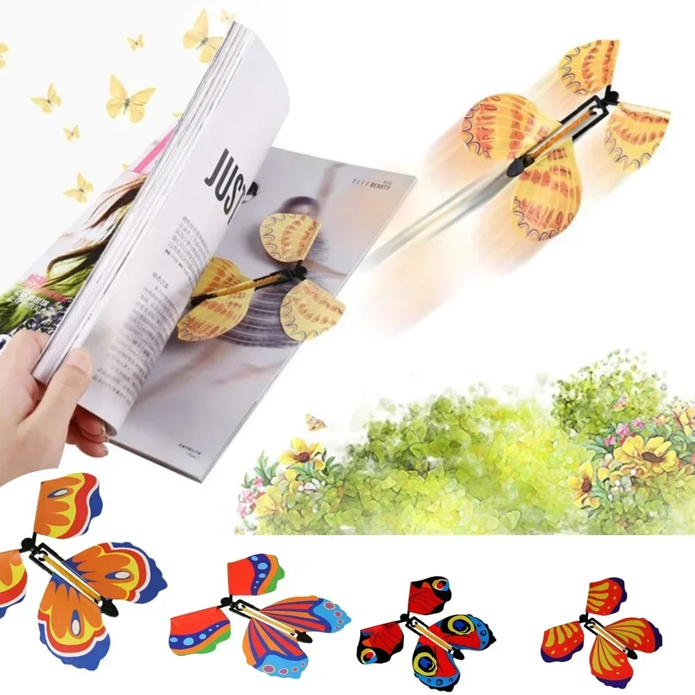 10Pcs Magic Wind Up Flying Butterfly In The Book Rubber Band Powered Flying Toy Wedding Props Tricks Christams Gift Dropship