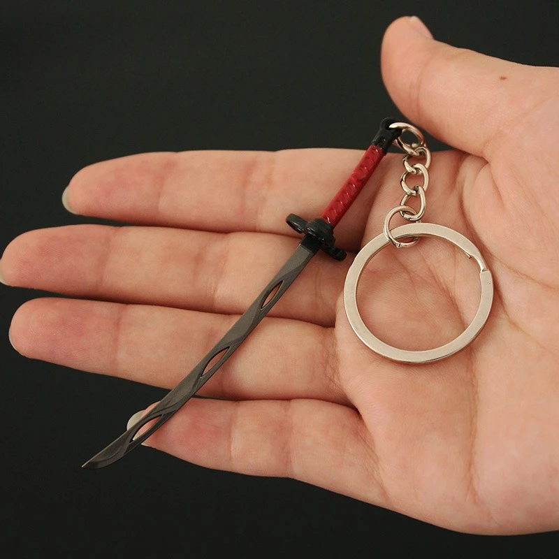 Stormrazor-Juego periférico de 9cm, modelo de Metal, armas y accesorios, accesorios de embalaje trasero, llavero, regalos de cumpleaños, juguetes