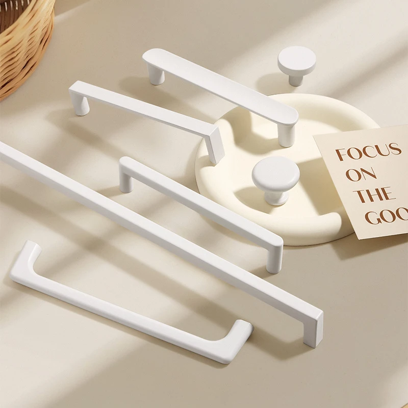 Poignée de meuble simple et élégante de couleur blanc laiteux, adaptée aux tiroirs, aux armoires à chaussures, aux placards et aux poignées de portes d'armoires.
