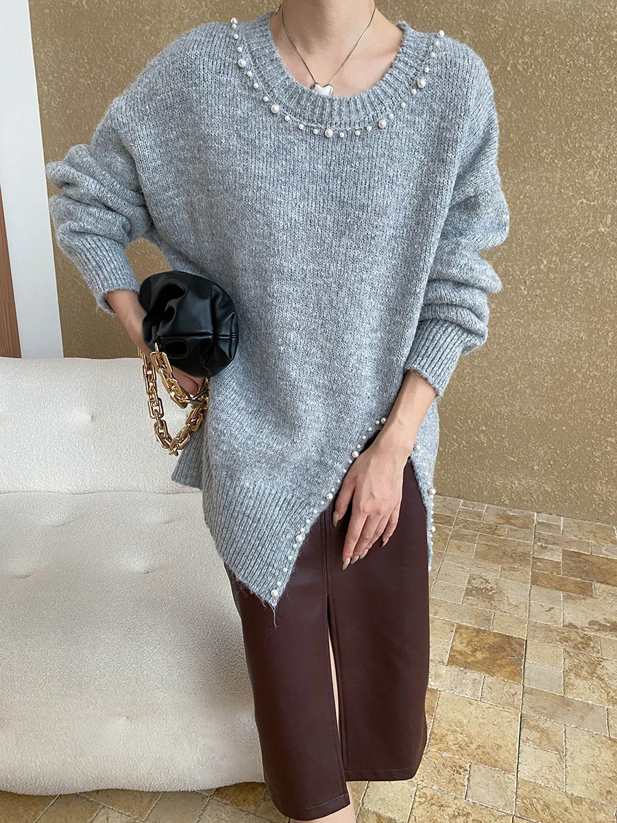 Autumn and winter women's casual solid color round neck long sleeved nail bead decoration loose sweater