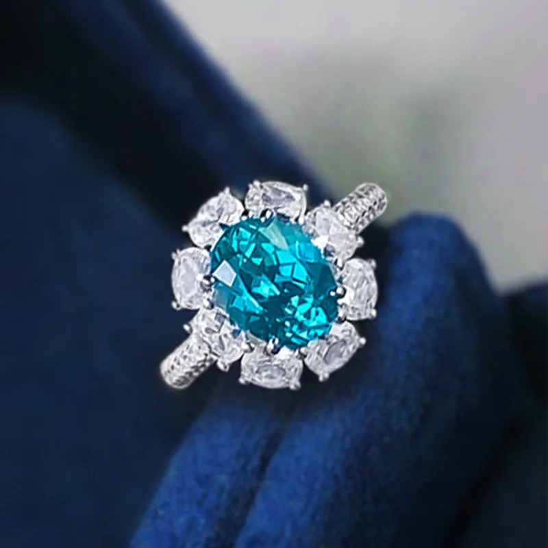 Cultivate a new 100% S925 silver Paraiba ring with 7 * 9mm oval flower pattern inlaid with light luxury wedding jewelry