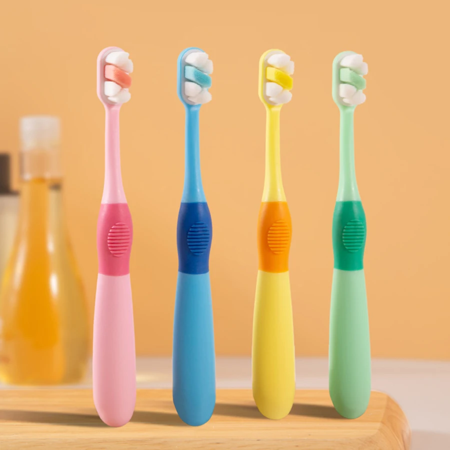 Children 3-12 years old ten thousand hair soft bristle toothbrush four colors available. Brush head with dust jacket