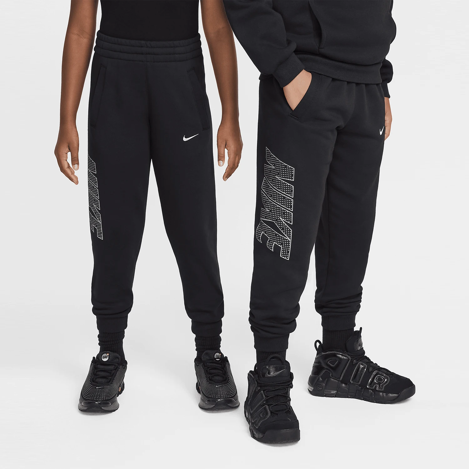 

Оригинальные спортивные трикотажные брюки Nike для больших детей HF4238-010
