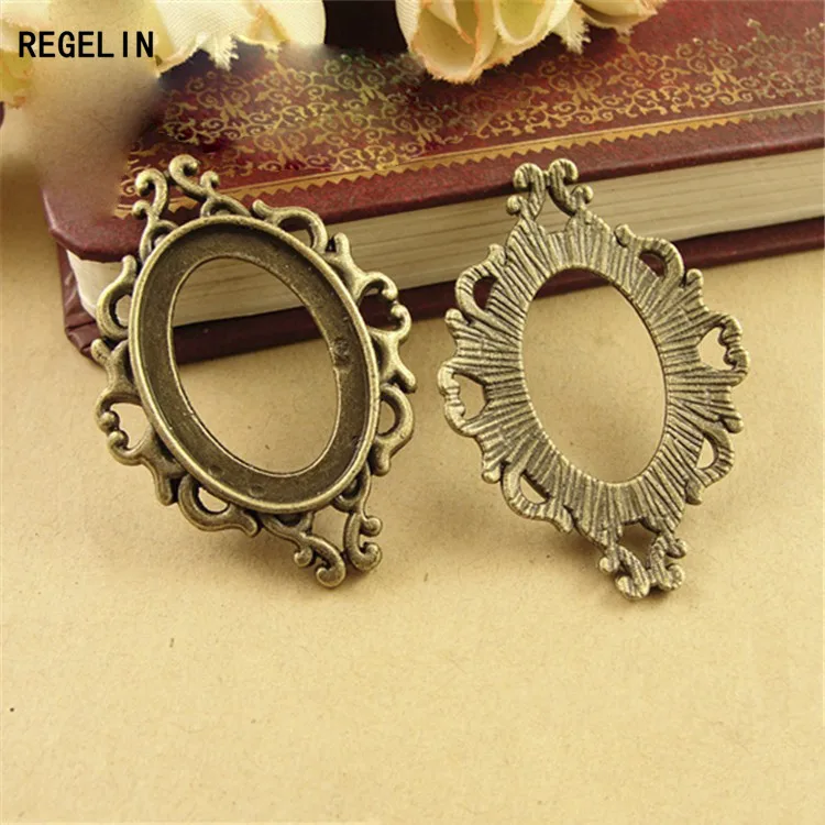 REGELIN High Qualtity 10pcs/lot Antique Bronze Metal Cabochon Pendant Settings 18*25mm Jewelry Pendant Blanks Fit Jewelry Making