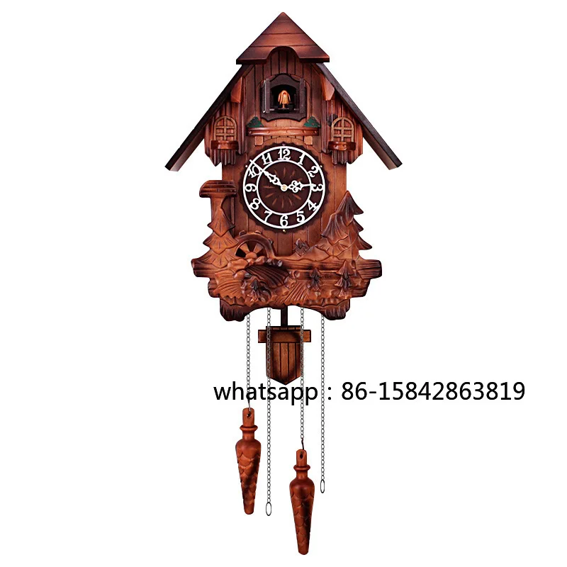 Solid wood hand-carved cuckoo wall clock children's music on the hour chime clock swing creative cooing clock