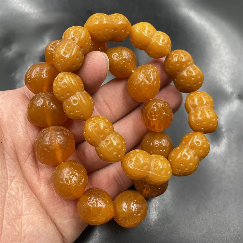 

Optimized Second Generation Amber Beeswax Peanut Old Agate Stone Bead Bracelet