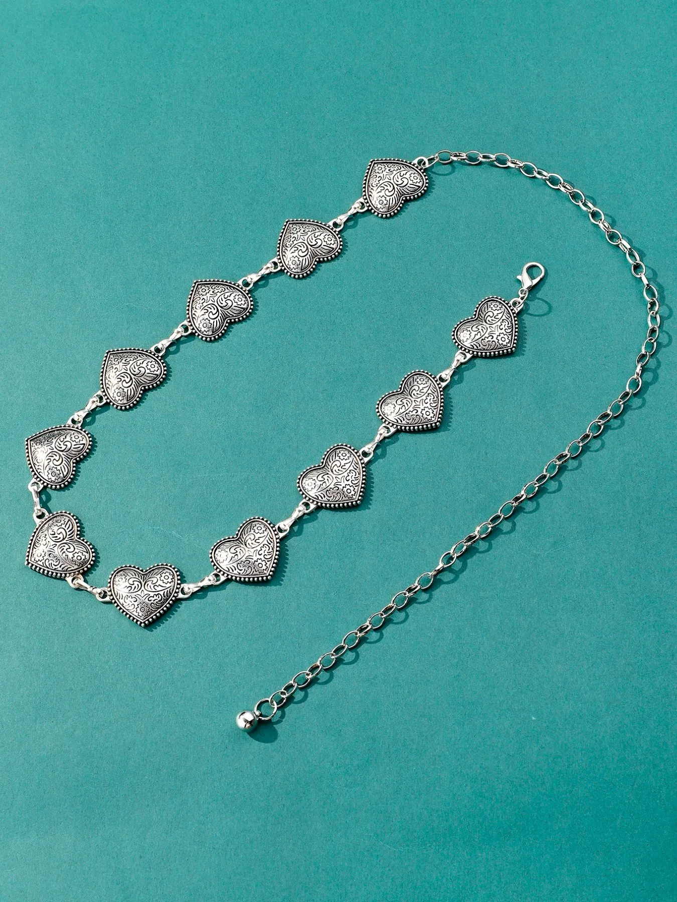 Cinturón de cadena vintage oro y plata con corazón para mujer_voghion.com