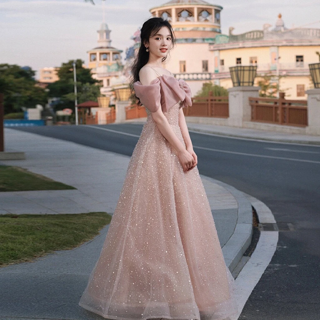 Starry Pink Celebrity Dresses Floor Length Off the Shoulder Sequins Bow Strapless Graduation Prom Performance Gowns 2024